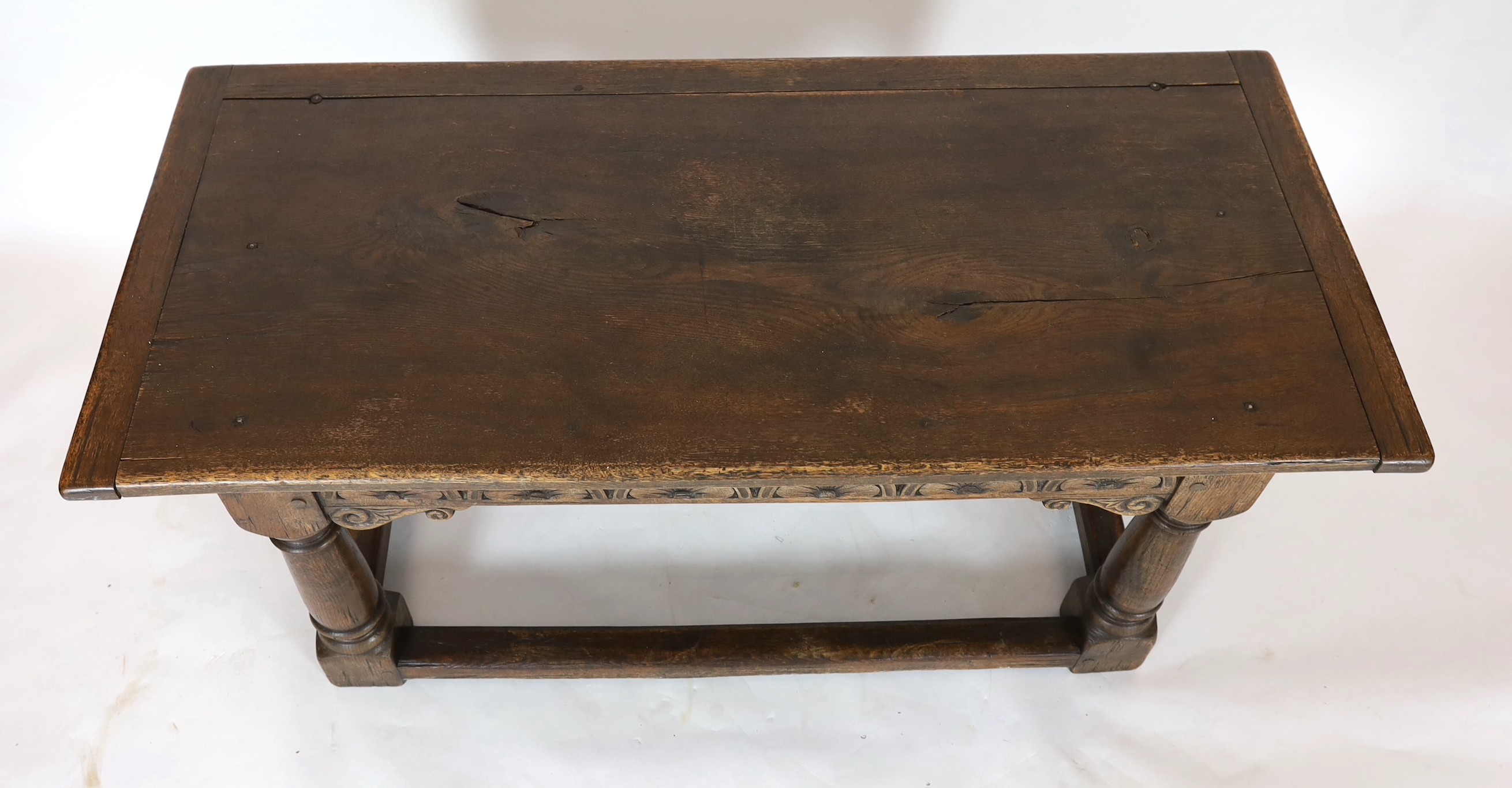 A 17th century style oak refectory table, width 167cm, depth 77cm, height 77cm